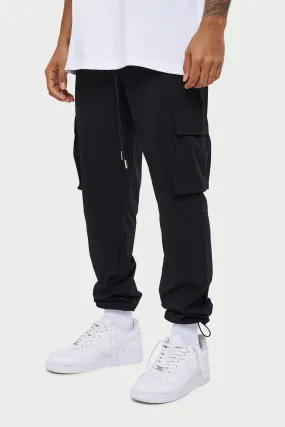 TECHNICAL SMART CARGO PANTS - BLACK